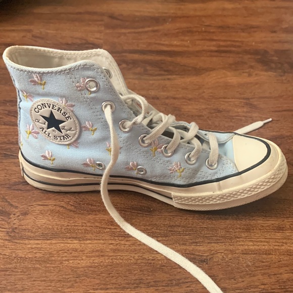 light blue converse with flowers